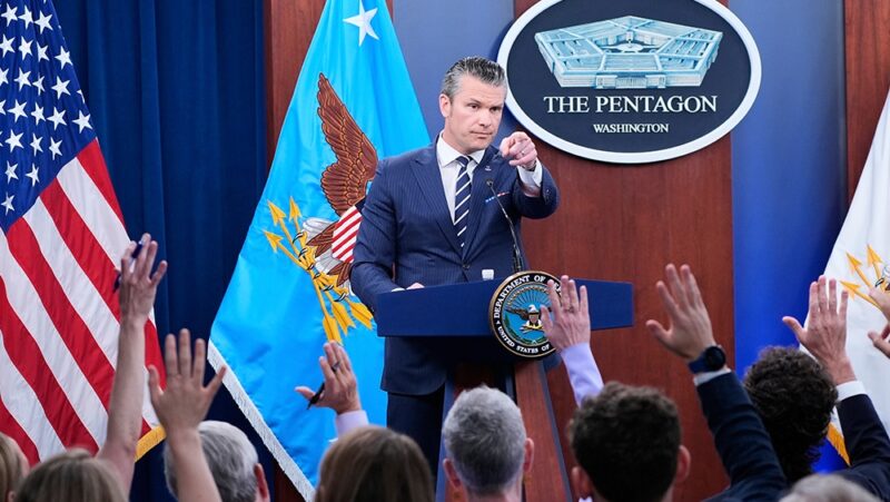 Defense Secretary Pete Hegseth calls on reporters for questions during a news conference at the Pentagon.